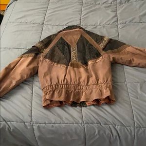 Brown leather jacket with patchwork detailing
